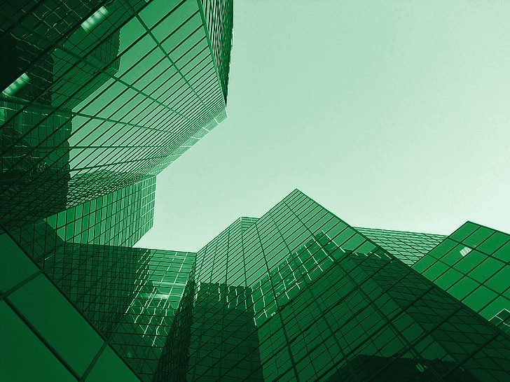 Glass office towers seen from below